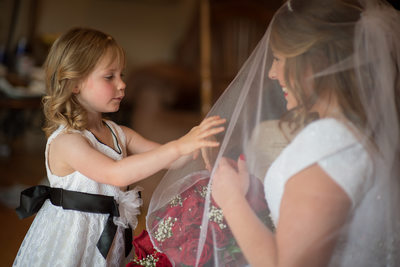 Bride And Flower Girl Moment