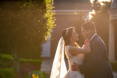 Warm sunset photo of an Indian Catholic fusion wedding at The Rockleigh