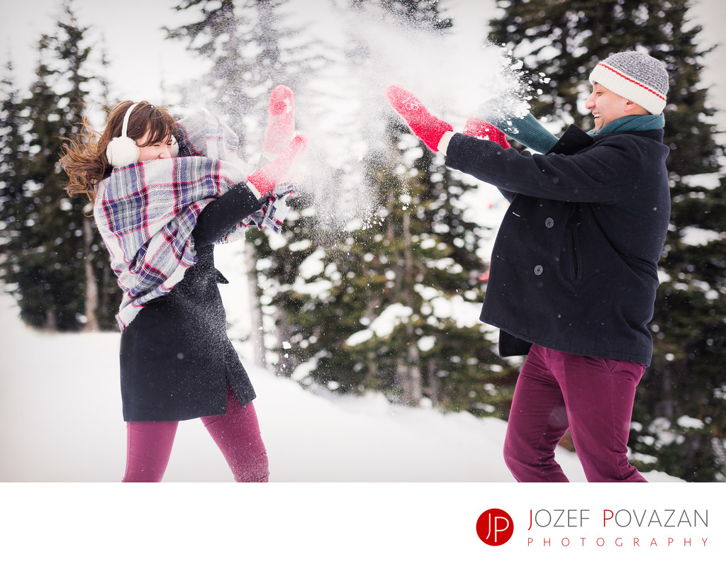Whistler engagement photography winter fun snow fight