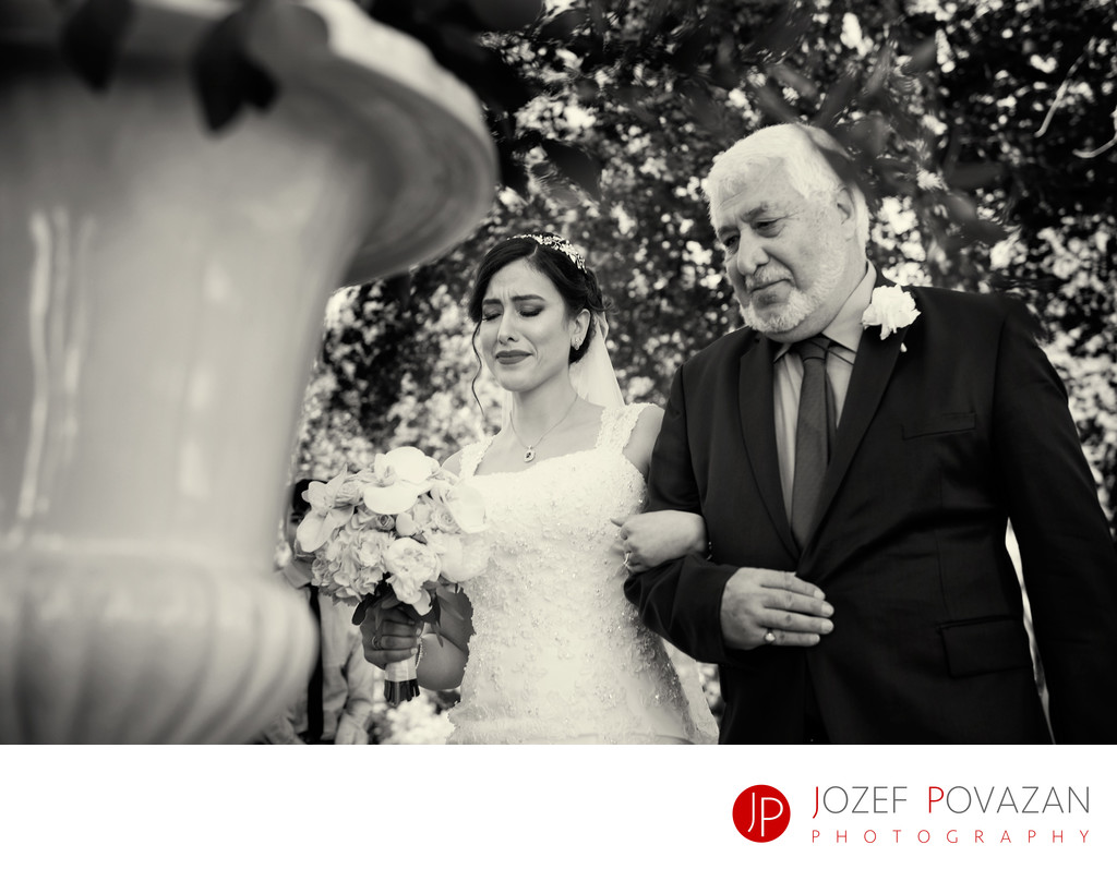 Persian bride and dad walking down the isle to ceremony