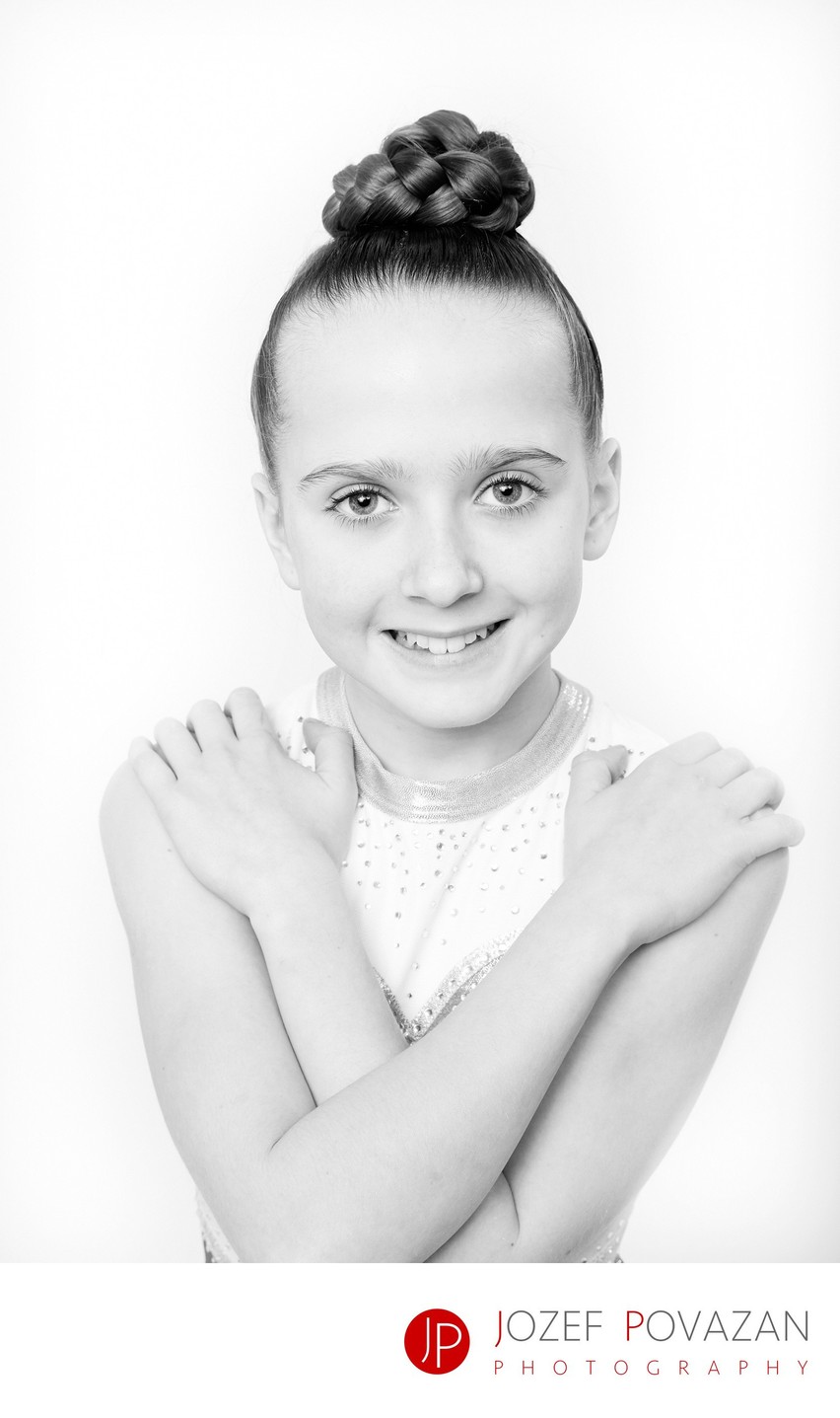 Black and white studio portraits of children gymnasts