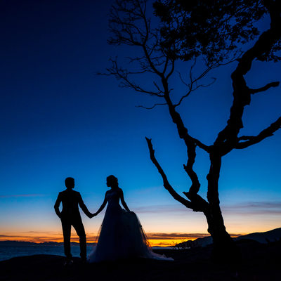 Dramatic sunset wedding silhouette pic Lighthouse park