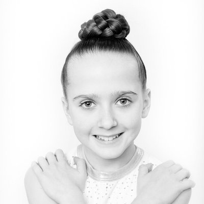 Black and white studio portraits of children gymnasts