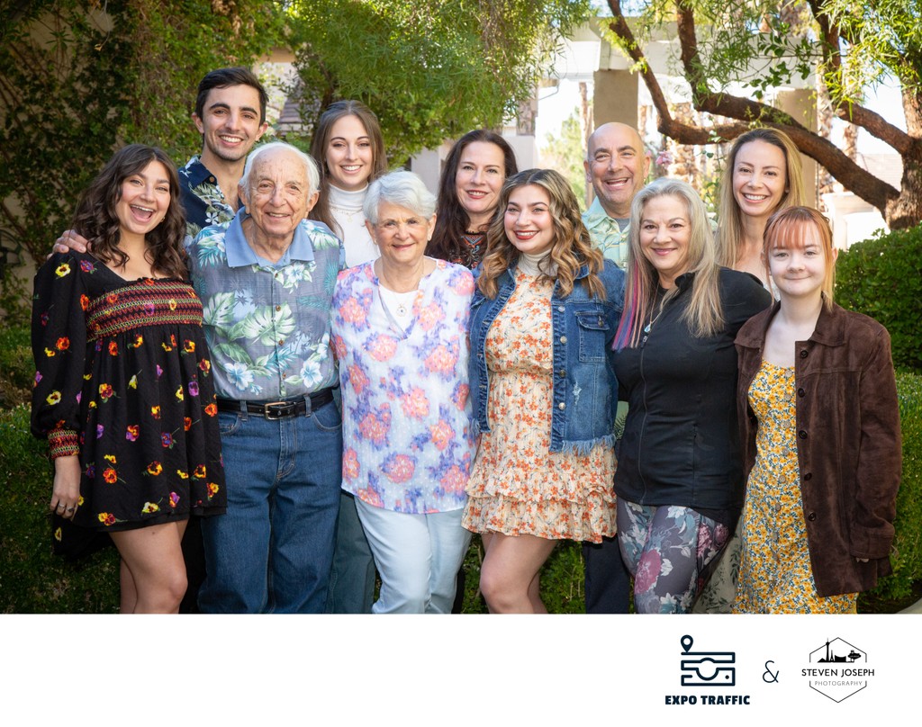 Outdoor backyard Family portrait of Multi-generational family reunion with relatives smiling together in Las Vegas