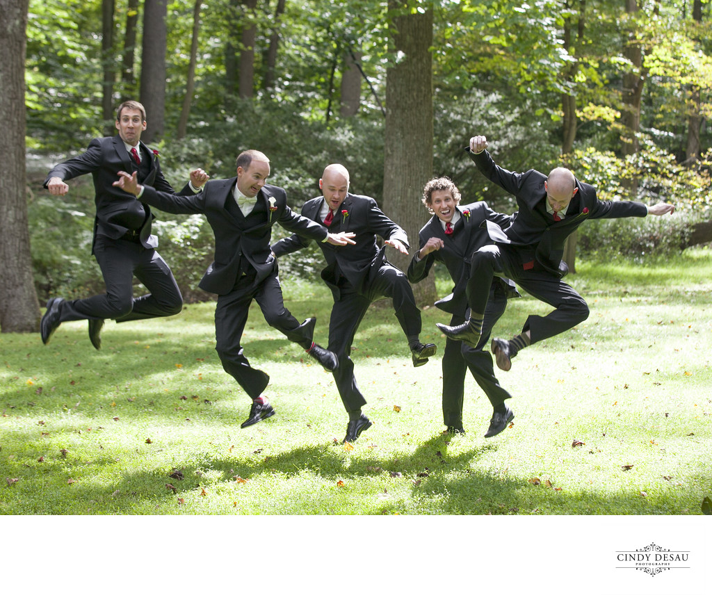 Leaping Groomsmen Having Fun Wedding Photo