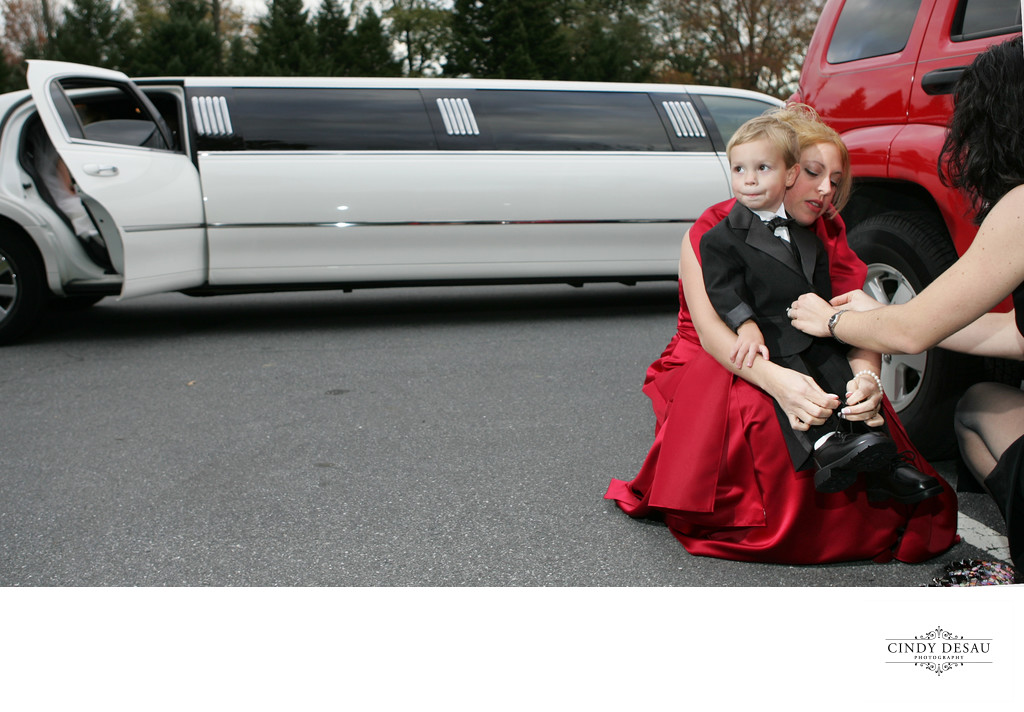 Ring Bearer Loses Shoes During Wedding Photographs