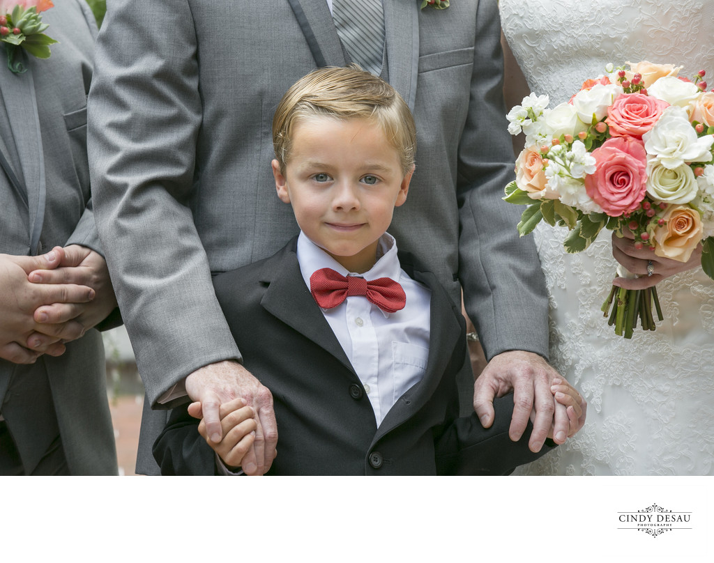 Cute Ring Bearer by Candid Wedding Photographer 