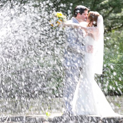 Fountain Sprays the Bride and Groom Photograph