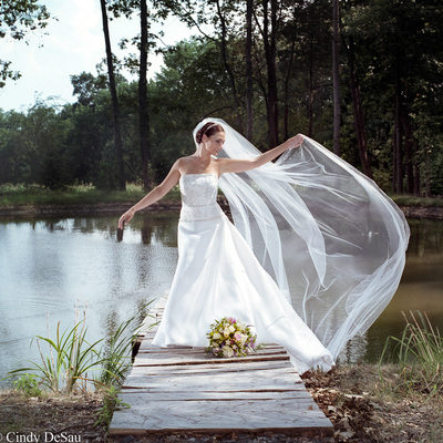 Bride on Dock with Long Veil in Solebury