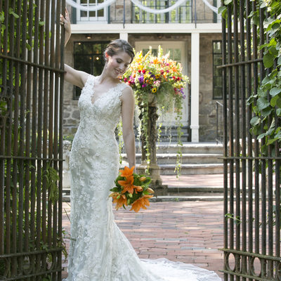 Bride at the Courtyard Gates of Holly Hedge