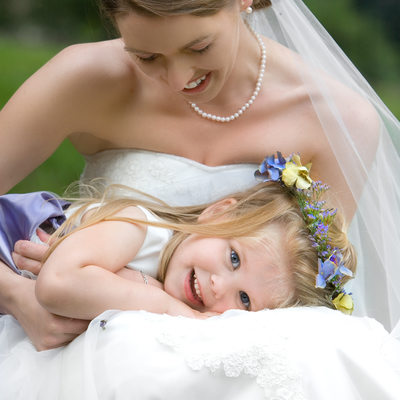 Adorable Flower Girl with Bride Moment