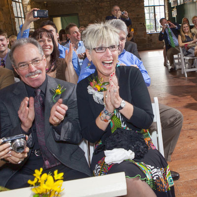 Guests Burst into Applause for Bride and Groom Photo
