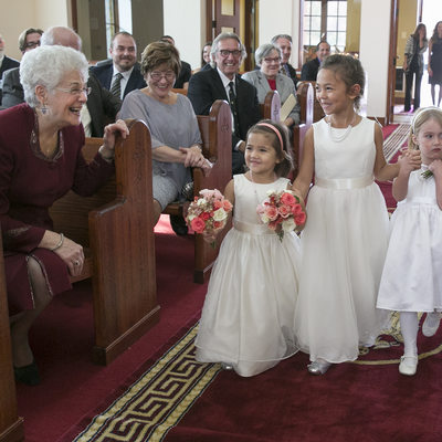 Overjoyed Guest and Flower Girls at Greek Orthodox Wedding