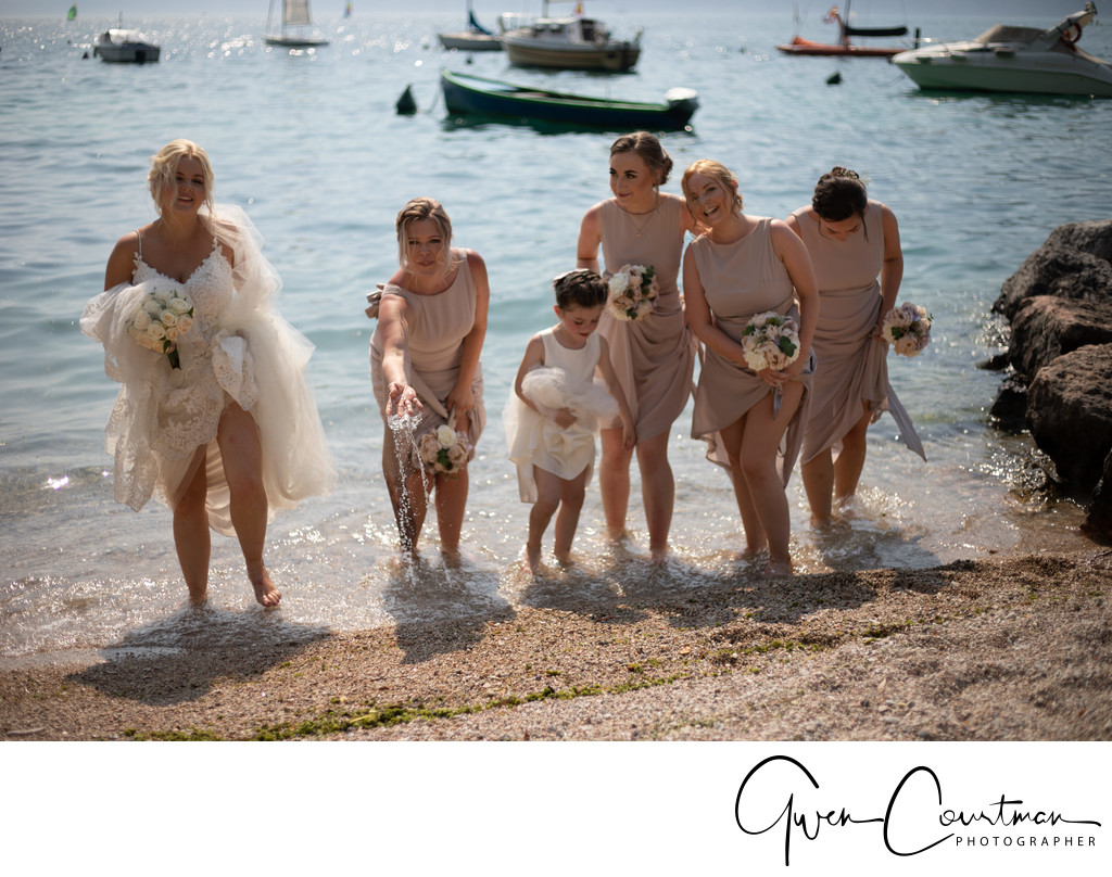 Sam and her maids, paddling. Stunning wedding in Italy.