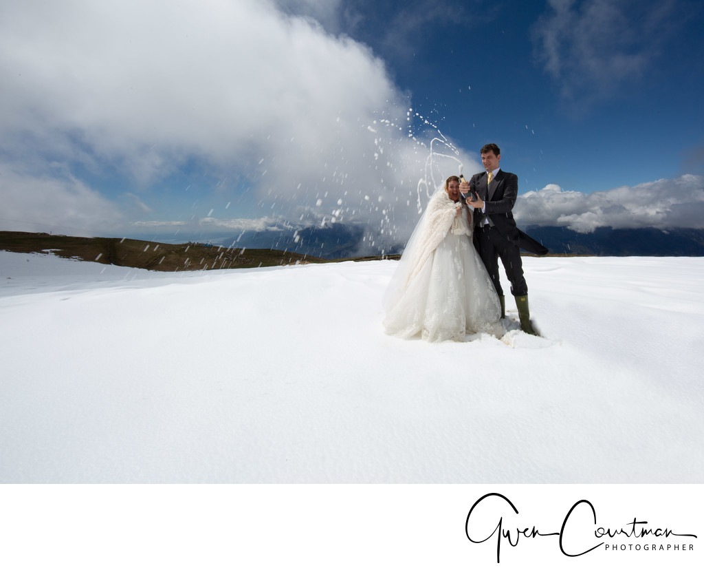 Trash the dress in the snow with bubbly, Italy