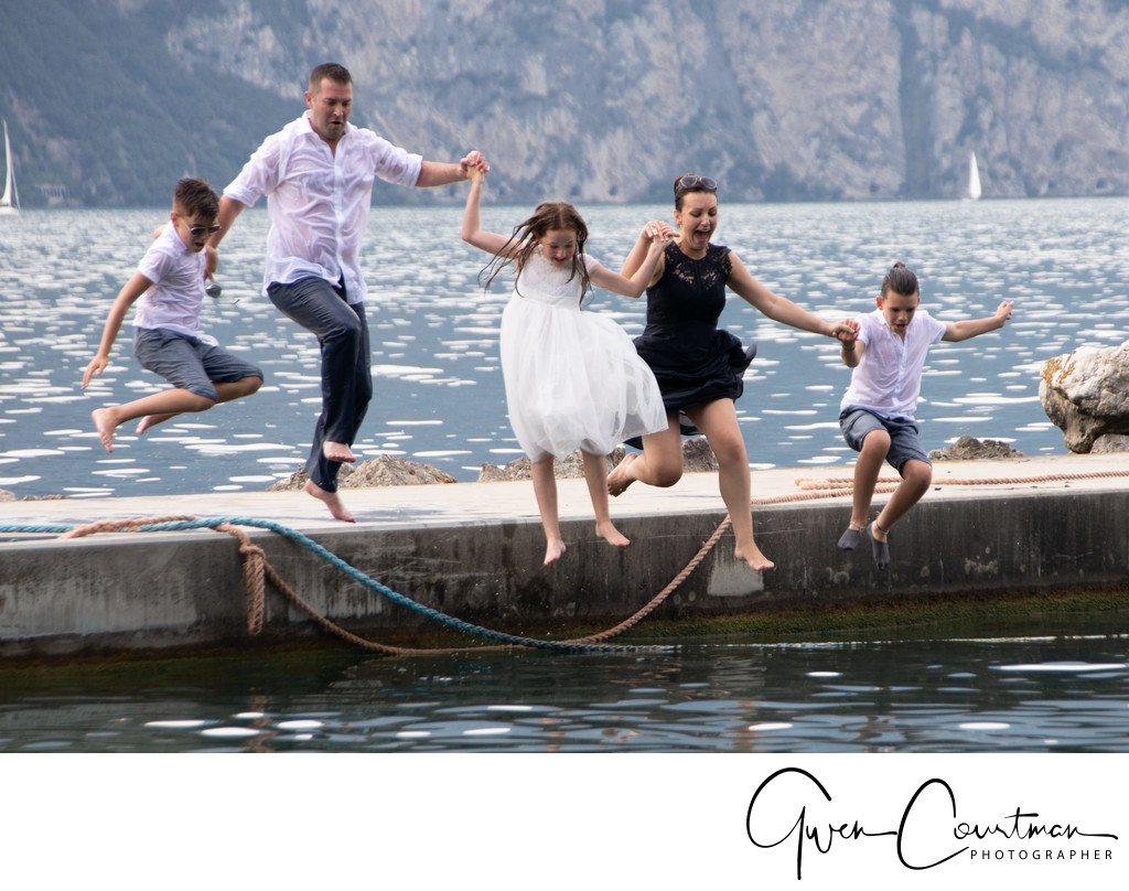 Family Trash the Dress Malcesine jumping in the water