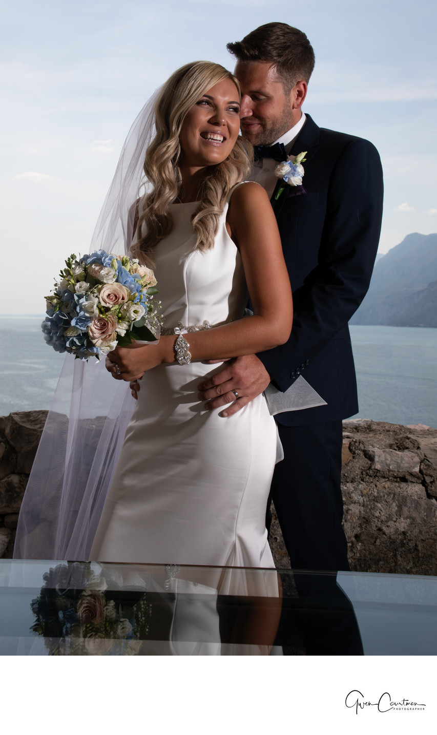 Happy bride and groom, Malcesine Castle Terrace, Italy