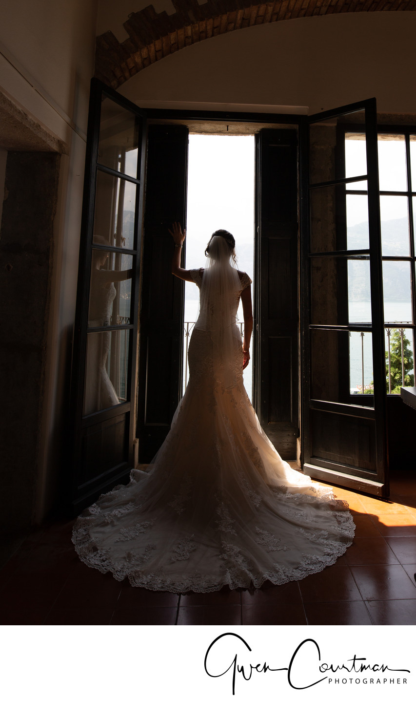 Silhouette bride in Malcesine Doorway.