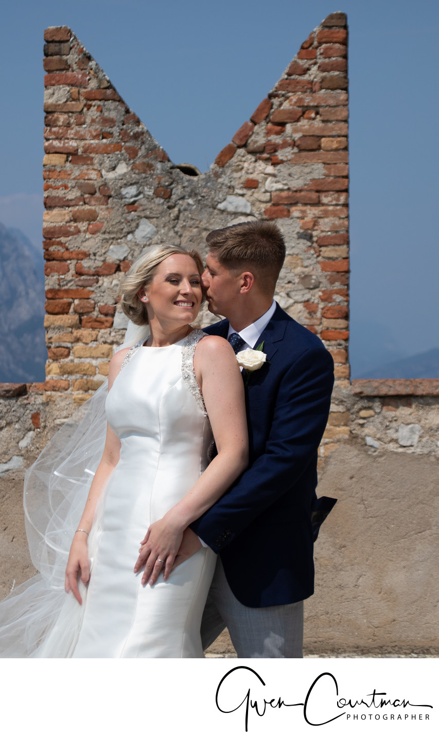 Bride and Groom on terrace, Malcesine Castle, Italy