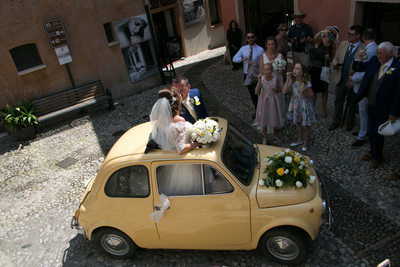 Bride and Groom in Fiat 500, Malcesine Castle, Italy