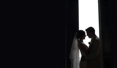 Silhouette bride and groom in Malcesine Doorway.