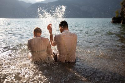 Emma and Tom, Splashing in Lake Garda, Italy