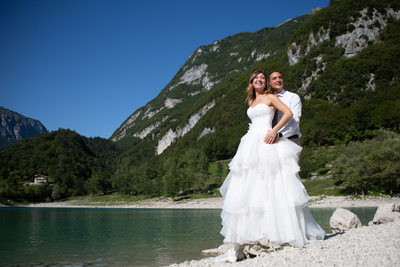 Couple on the rock, Wedding photographer in Italy.