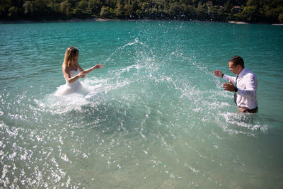 Romance and splashing in the water, Italy Lake Tenno