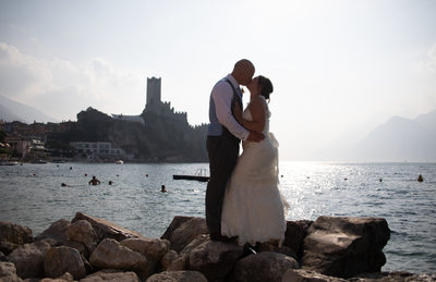Wedding Couple, Malcesine Castle in the background.