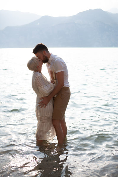 Em and Tom kissing in the water, Lake Garda , Italy