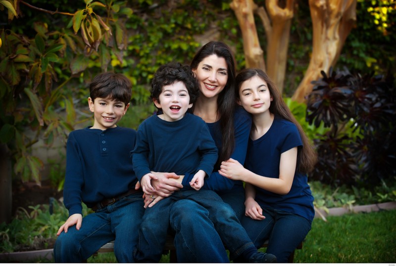 Family portrait in garden with dark clothing