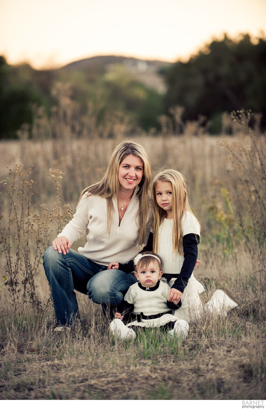 Environmental family portrait of Mom and Daughters