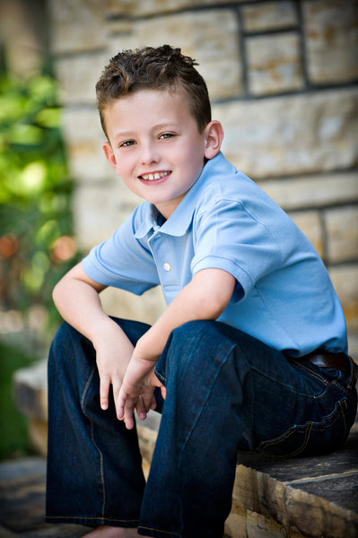 Environmental young boy's portrait on location
