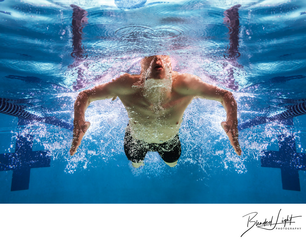 Breaststroke swimmer in perfect symmetry underwater pic