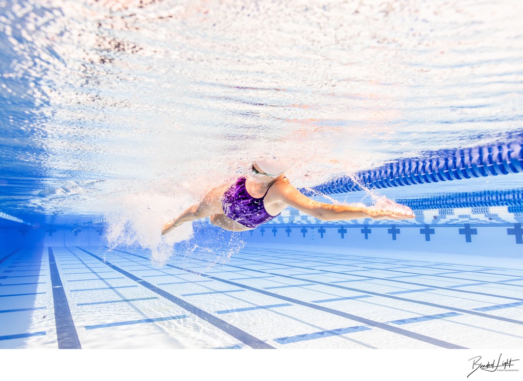 Senior Freestyler Swimming Underwater Outdoor Pool