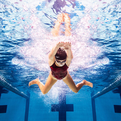 Straight on image of the butterfly stroke underwater