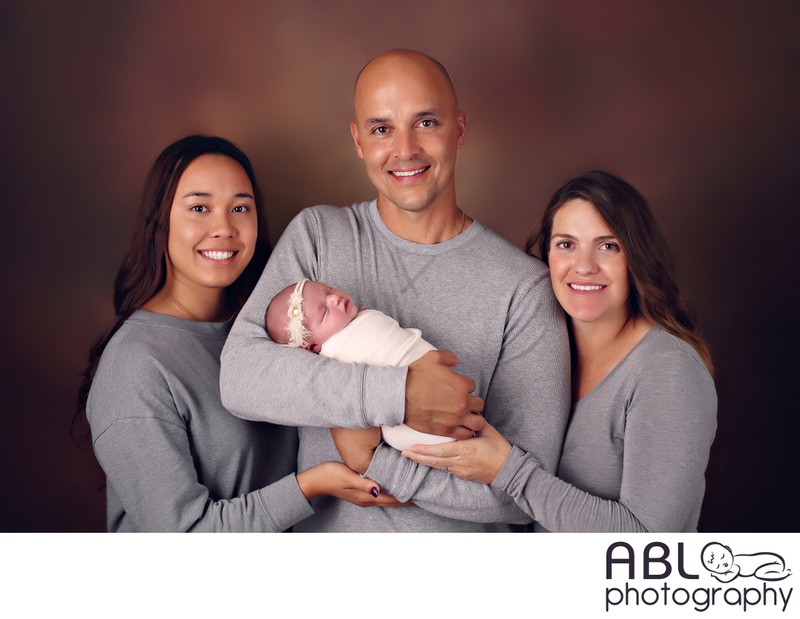 Family portrait with newborn girl