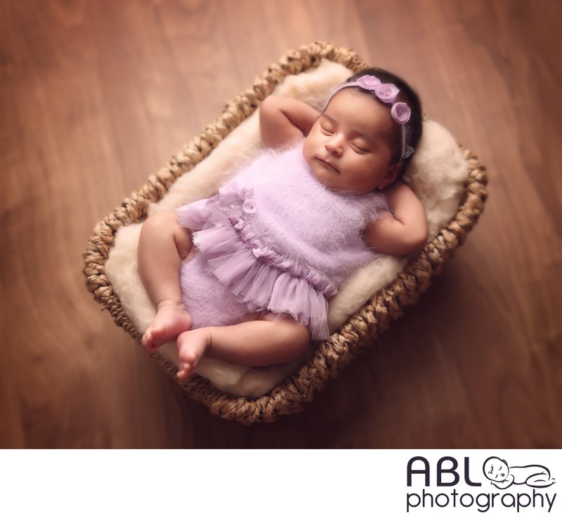 Studio baby photos in San Diego, newborn girl in purple