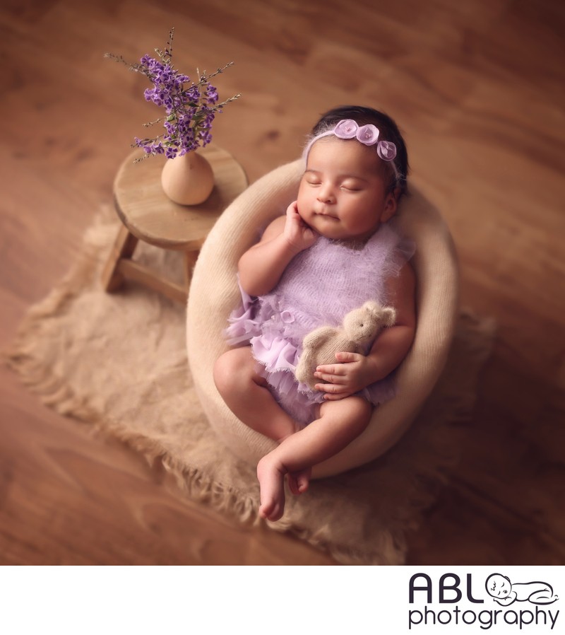 Best San Diego newborn photographers, baby in purple