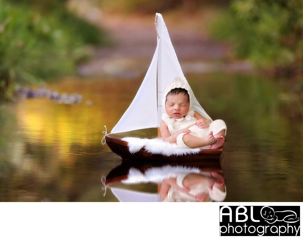 San Diego outdoor newborn photography, baby sailing