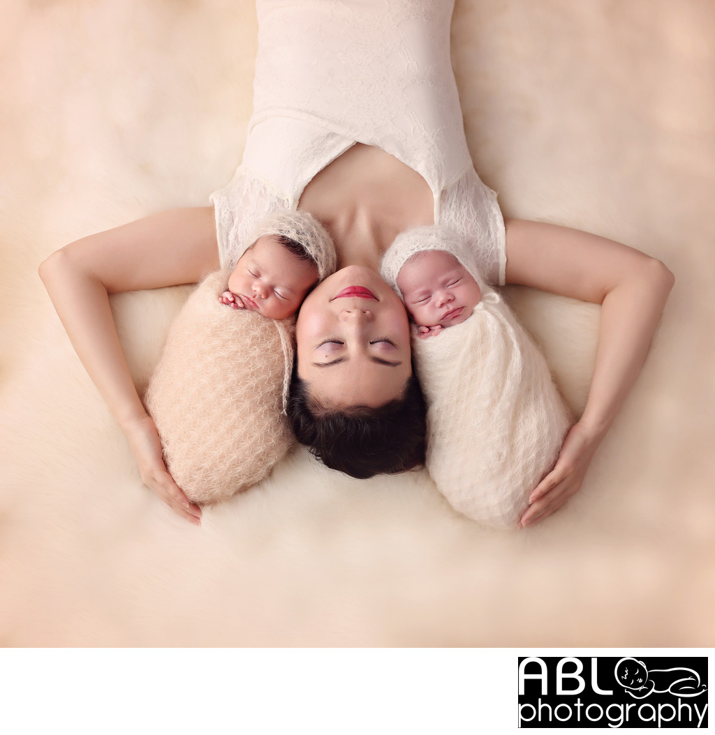 Mom with twin girls newborn photos in Santee, CA