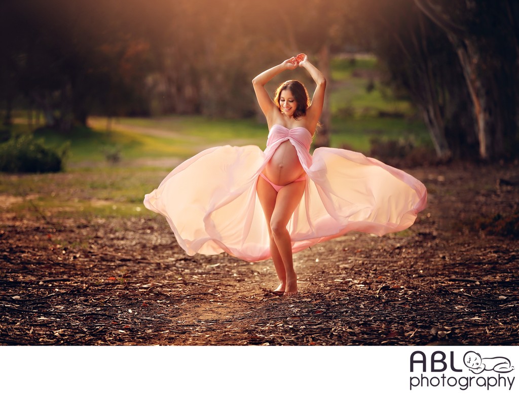 Maternity photography San Diego. Dancing pregnant mama