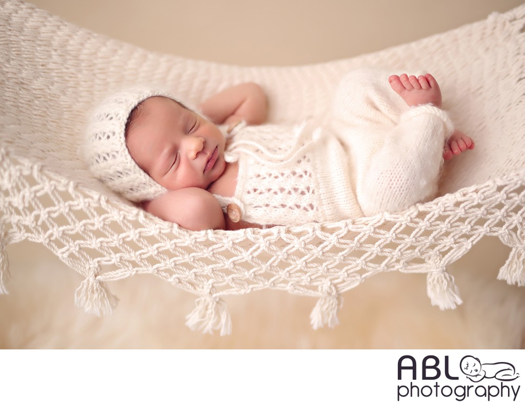 La Mesa newborn photographer, baby in cream hammock