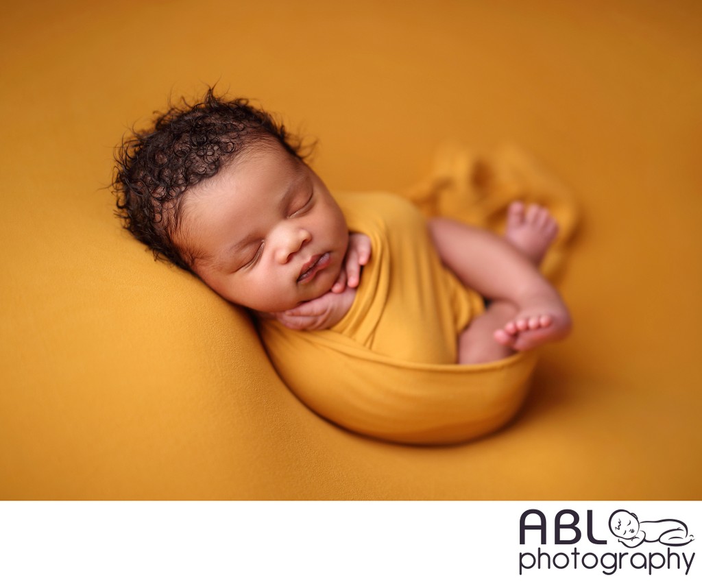 baby wrapped in yellow, San Diego newborn pictures