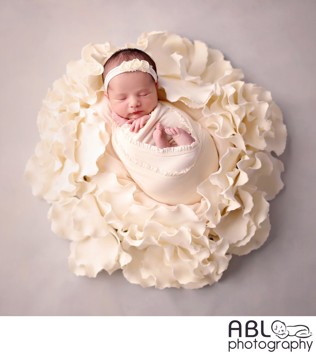 Baby girl in cream flower, Bonita newborn photographer