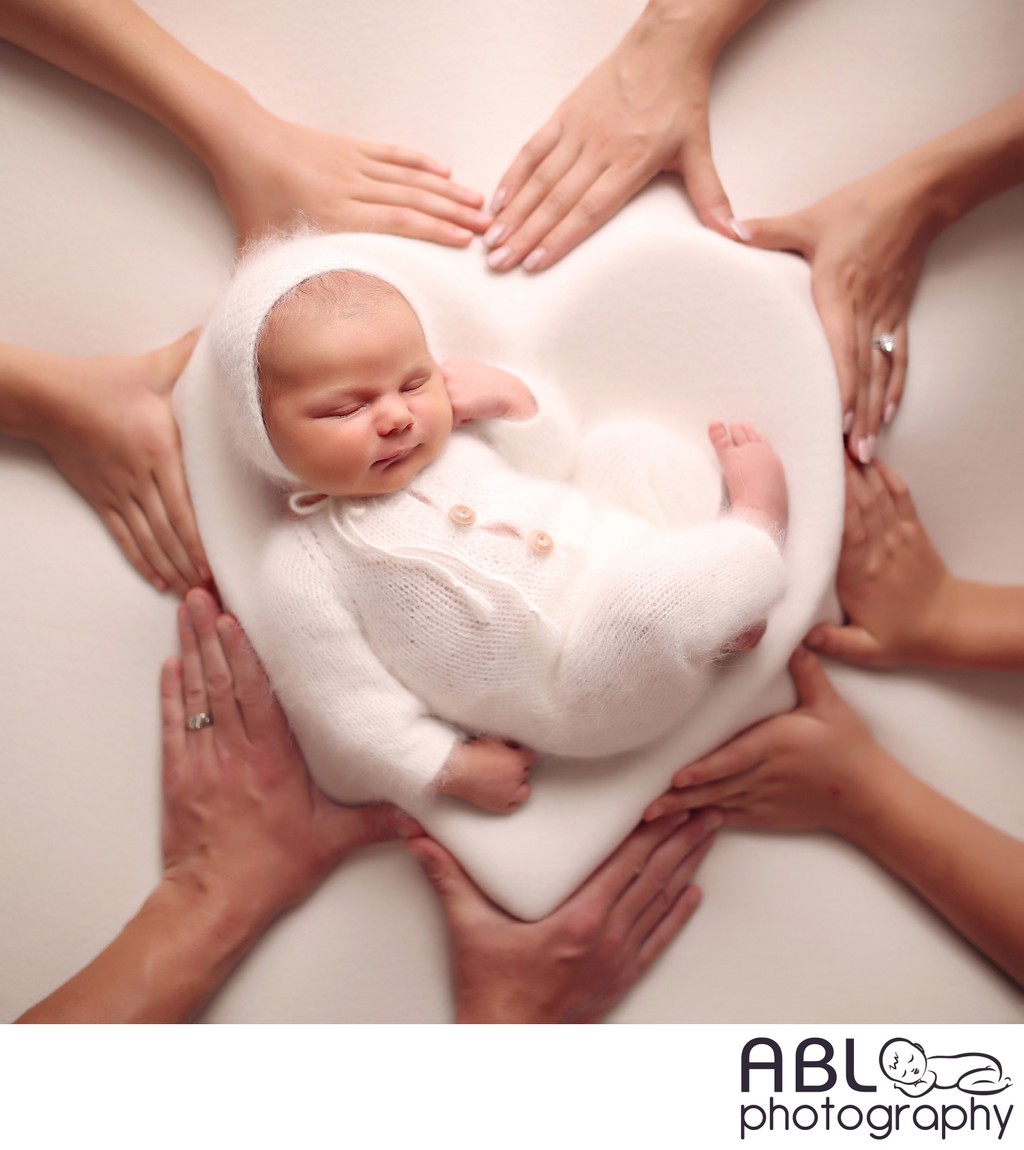 Infant Photoshoot Newborn Baby Posed in the Heart Bowl 