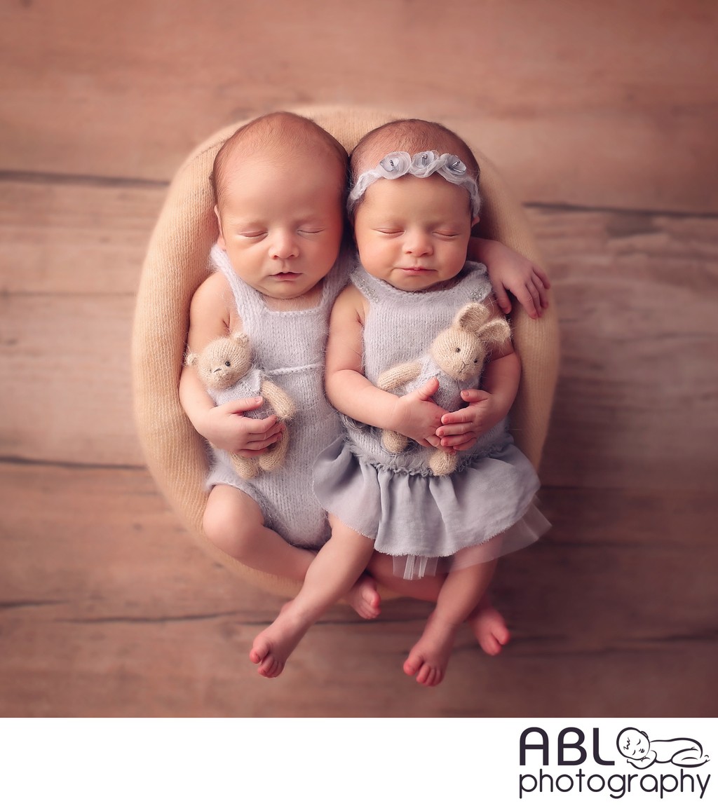 Twin knitted outfits for Del Mar newborn photo shoot