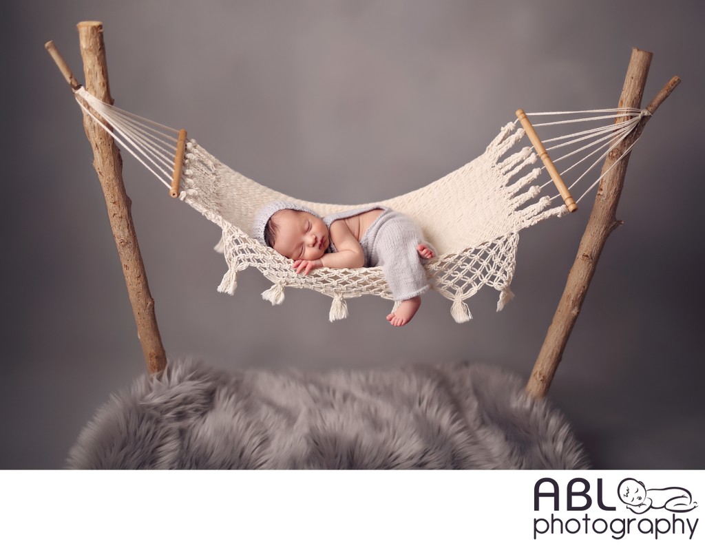 San Diego baby photography, newborn in hammock on gray