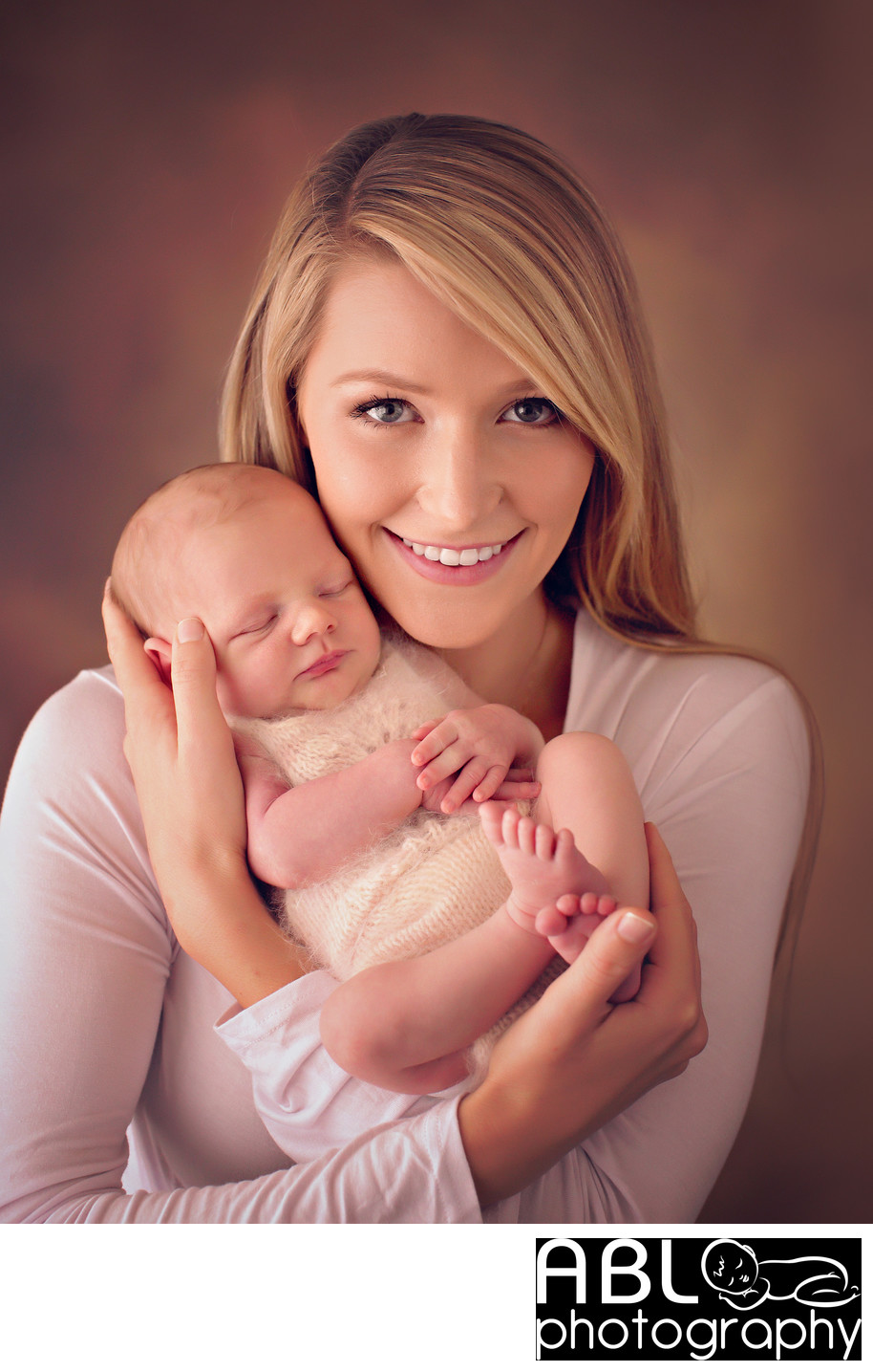 San Diego newborn photography with mom holding newborn