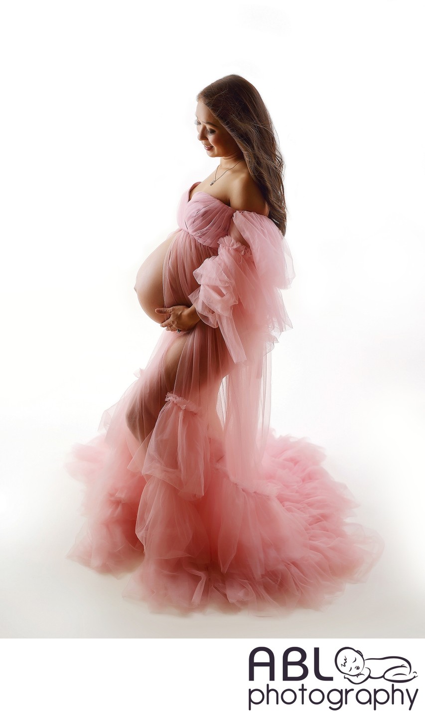 Studio Maternity photos with dramatic lighting
